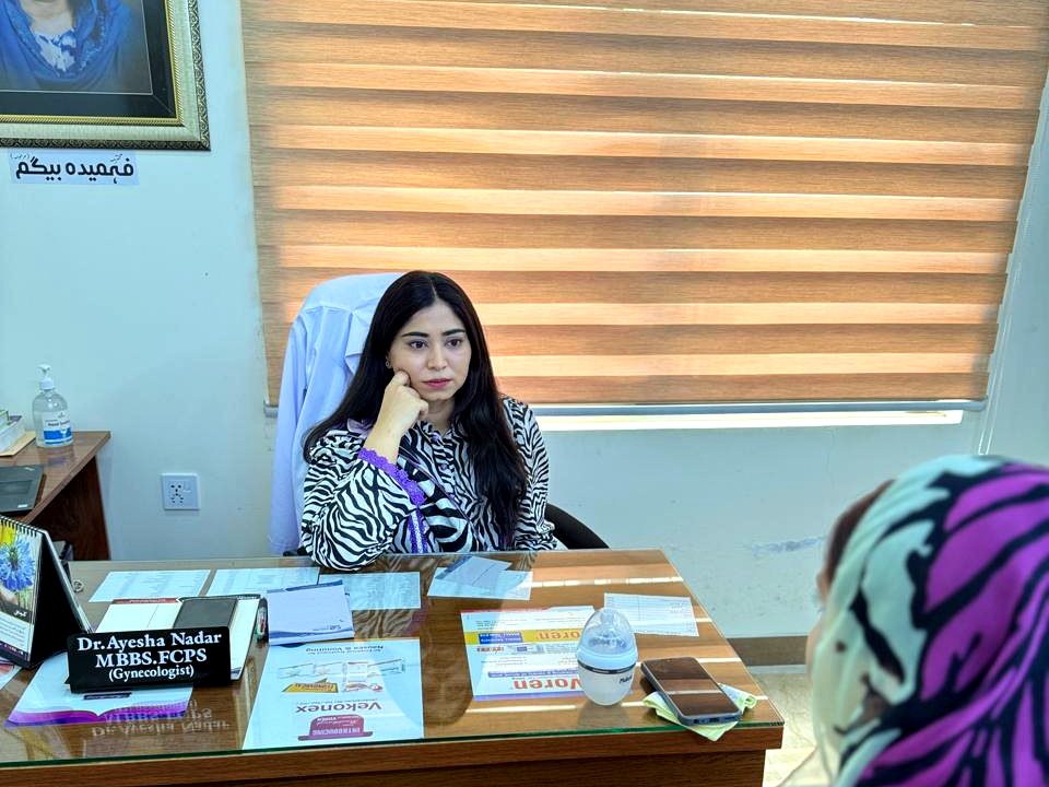 Doctor consultation with mother and child at the Women & Child Health Care Center
